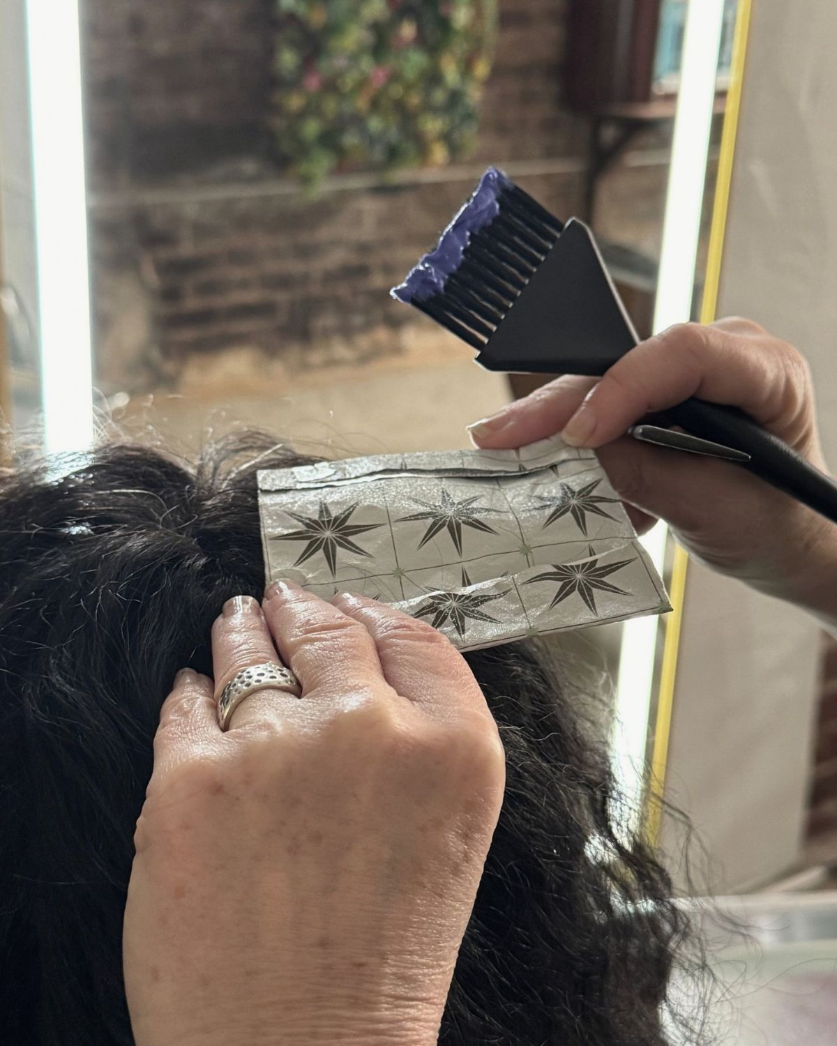 Hands and tools in use during a service
