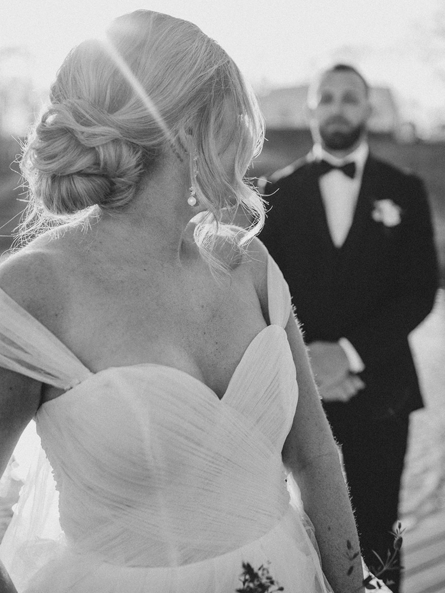 Bride with softly styled hair in natural light