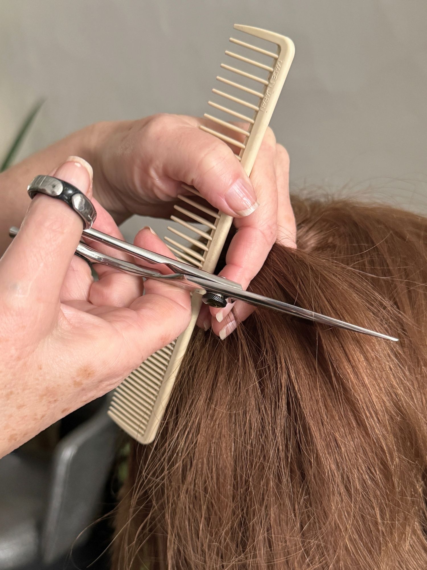 Close detail of haircutting in the studio