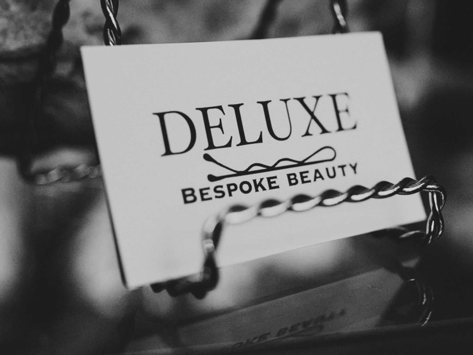 Deluxe Bespoke Beauty business card